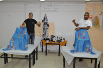 صور: صالون النزهة يتبرع بحلاقة مجانية لطلاب مدرسة حسن عرفة بمناسبة العيد